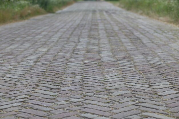 Photo old brick road close up