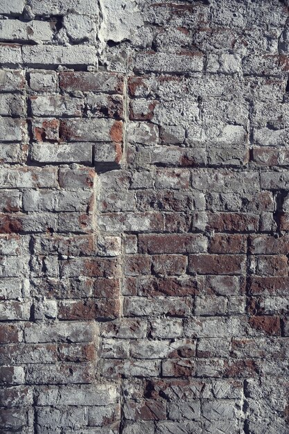 old brick wall background / abstract vintage background, vintage stones, bricks texture