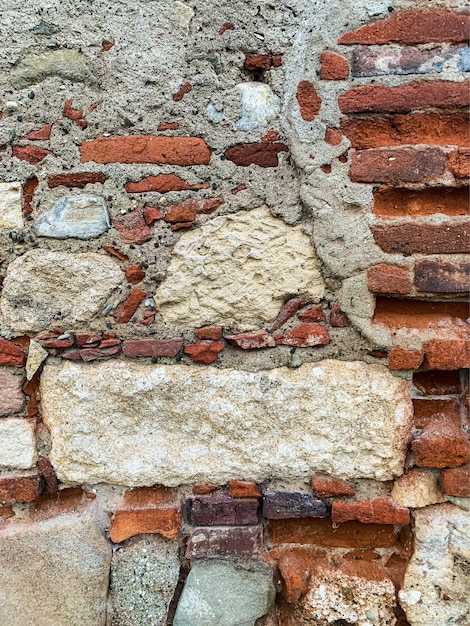 Foto vecchio muro di mattoni di fondo struttura del muro di mattoni