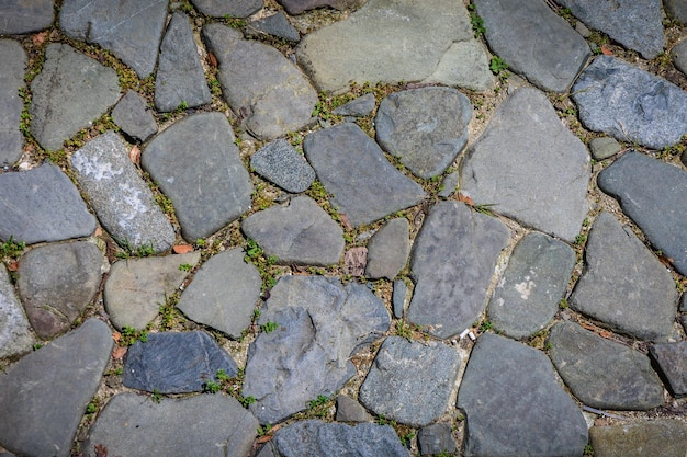 Photo old brick wall from a stone 2