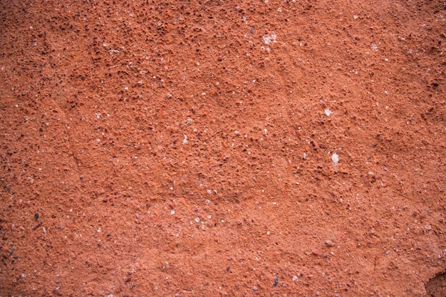 Old brick wall red plaster texture can be used as a background wallpaper