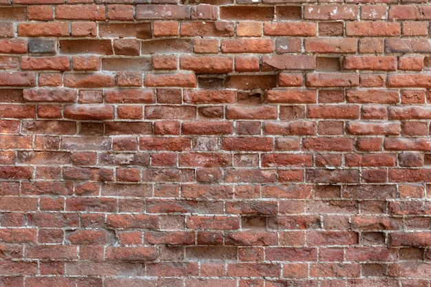 Foto vecchia struttura del muro di mattoni - costruzione, facciata