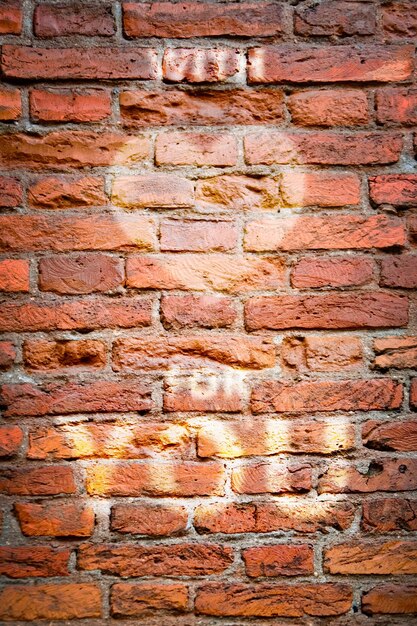 Old brick wall texture picture of red heart fof Valentines Day