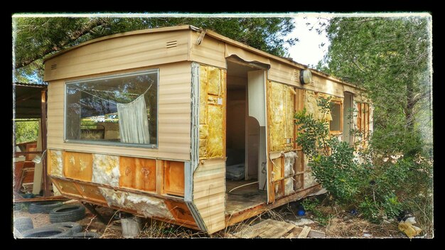 Old broken down motor home in forest