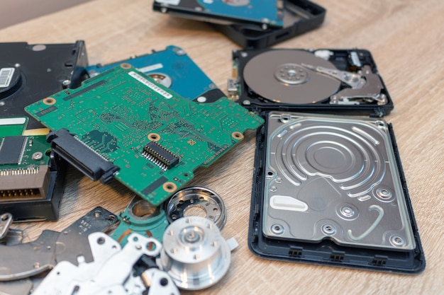 Old broken hard disk drives composition in a repair recovery service