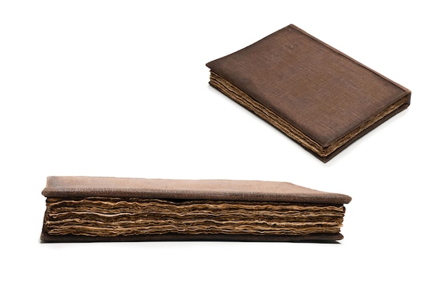 An old brown book isolated on a white background.