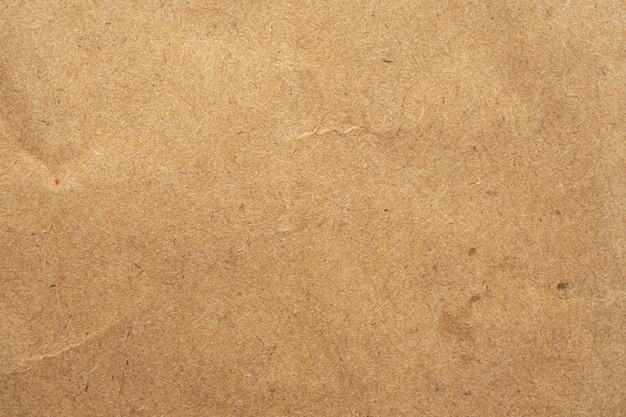 Old brown eco recycled kraft paper texture cardboard background