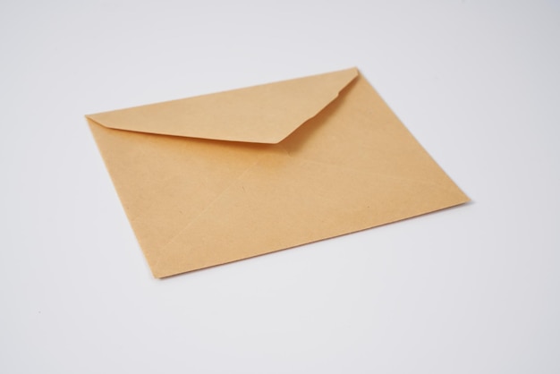 Old brown envelope on a white background