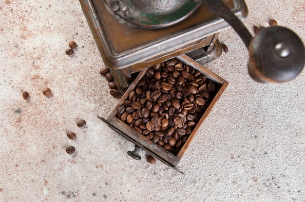 Old brown metal coffee grinder