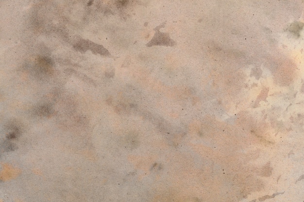 Old brown paper grunge background. Abstract liquid coffee color texture.