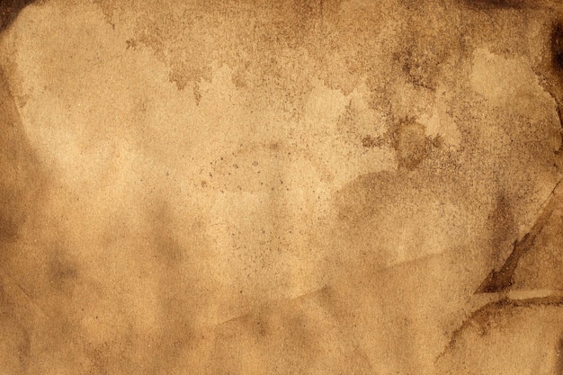 Old brown paper grunge background Abstract liquid coffee color texture