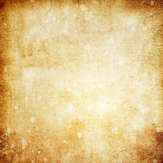 Old brown paper grunge background with a copy of the space and a place for the text