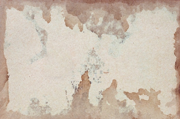 古い茶色の紙グランジ壁。抽象的な液体コーヒーの色の質感。