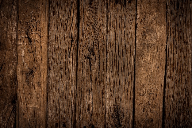 Old brown wood texture background. Dark wooden table top view angle.