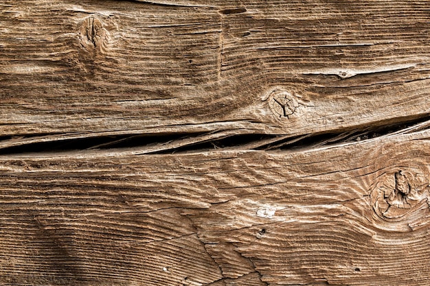 Текстура старого коричневого дерева с трещинами