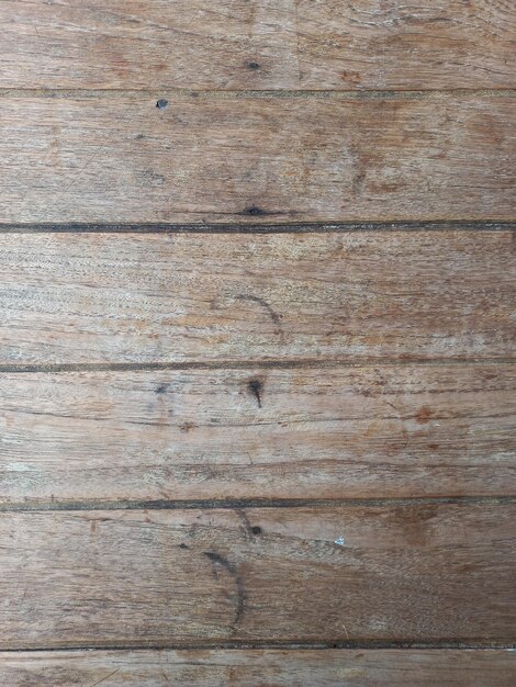 Old brown wooden planks with drifting traces of old and antique