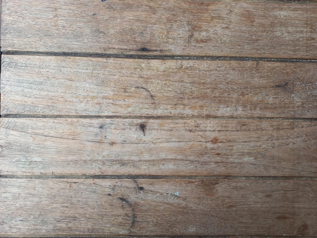 Old brown wooden planks with drifting traces of old and antique