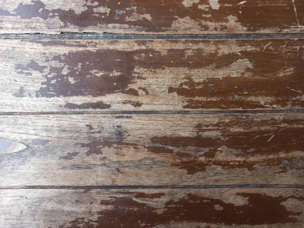 Old brown wooden planks with drifting traces of old and antique