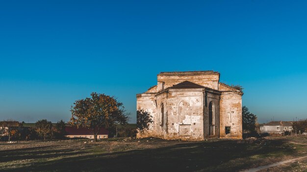 Old building against clear blue sky