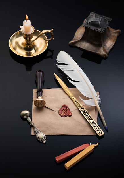 Old Business Writing Set: Bronze Inkwell, Writing Feather, wax stamp seal, letter opener and sealing wax