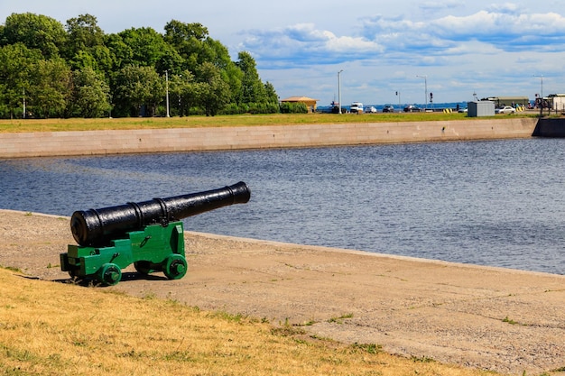 Old cannon on the coast of the Italian pond in Kronstadt Russia