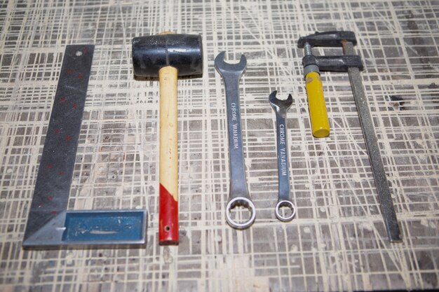 Old carpenter's tools for work are on the workbench