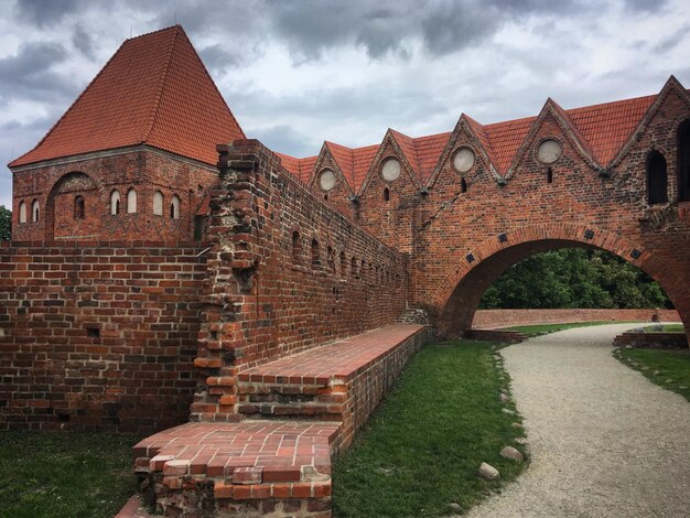 Photo old castle in the city toru poland may 2019