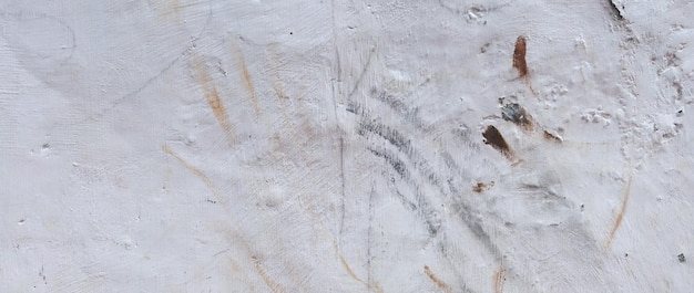 Old cement full of stains and scratches can be used as a background