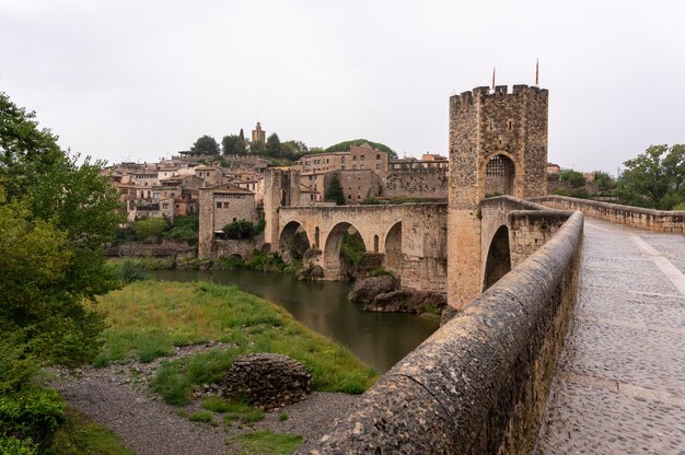 Old cityscape of medieval village and tower