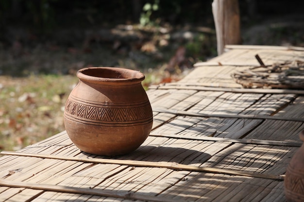 An old clay pot placed in the sun
