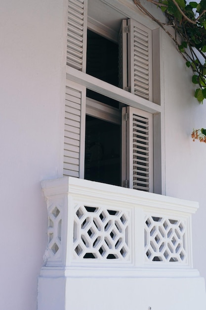 Old colonial balcony in a historic white building in Cartagena Colombia