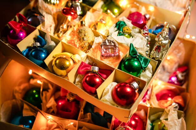 Old colorful Christmas decorations with fur-tree and toys