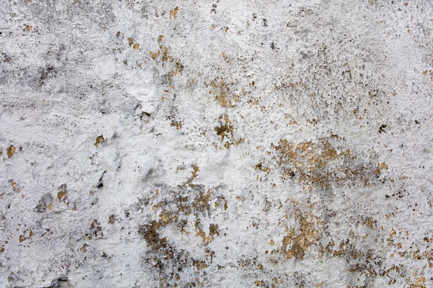 Old concrete wall with paint peeling off background