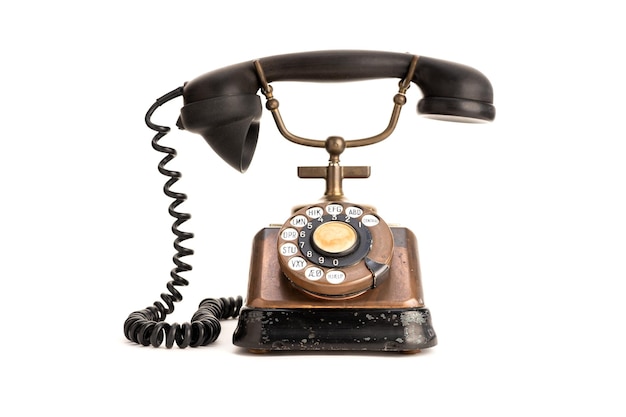 Old copper telephone with bakelite handset isolated on white background 30s telephone