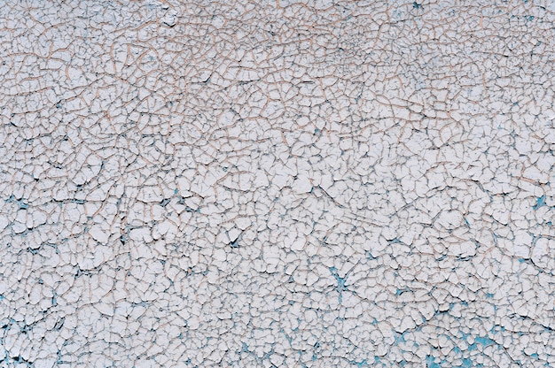 Old cracked paint on a wooden wall.