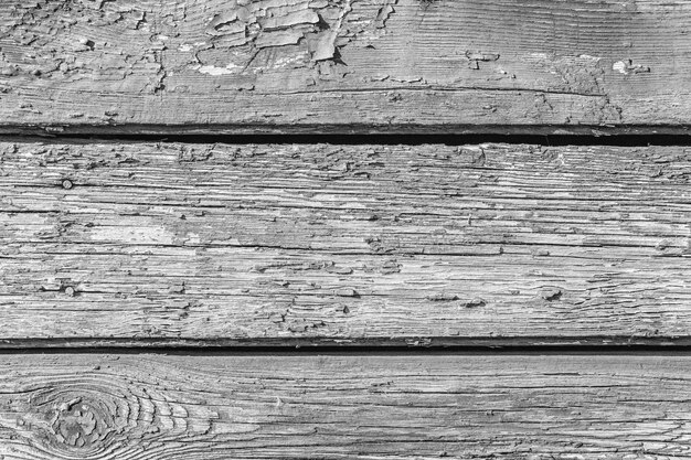 Old cracked rusty paint  background texture close-up black and white