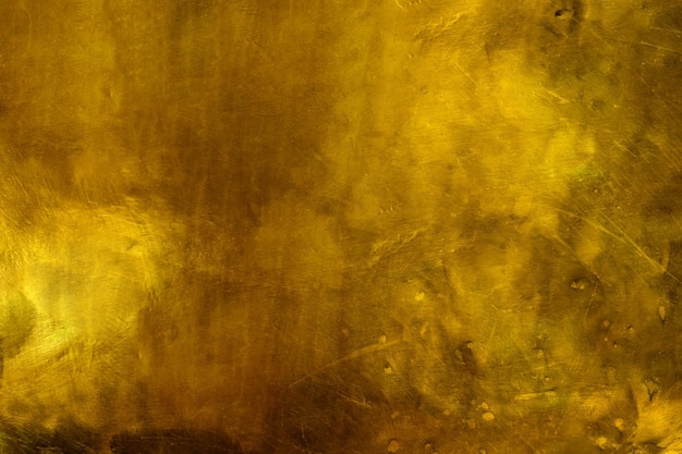 Old dark gold texture background with scratches