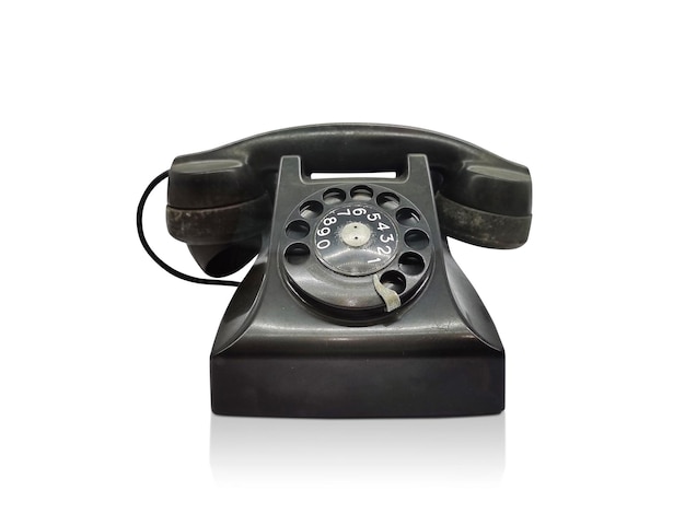 Photo old desk phone front view isolated on a white background