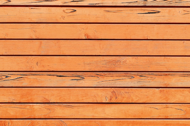 古い汚れたオレンジ色の木製の背景抽象的な背景上面図コピースペース