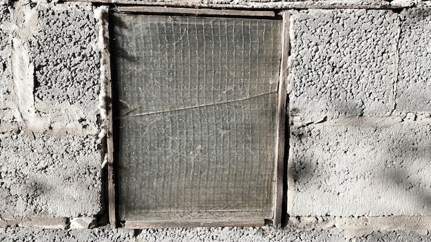 Old dirty reinforced glass in the shed