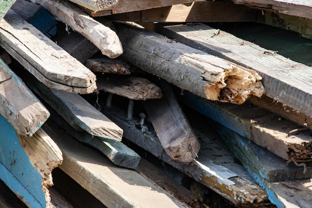 Old dry boards and logs close up