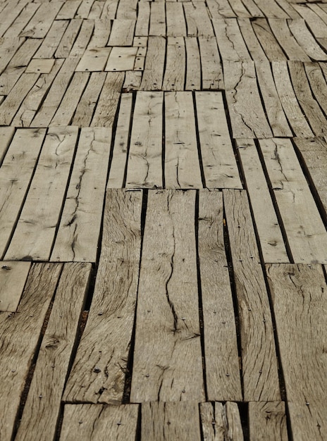 Old dry and cracked wooden floor.