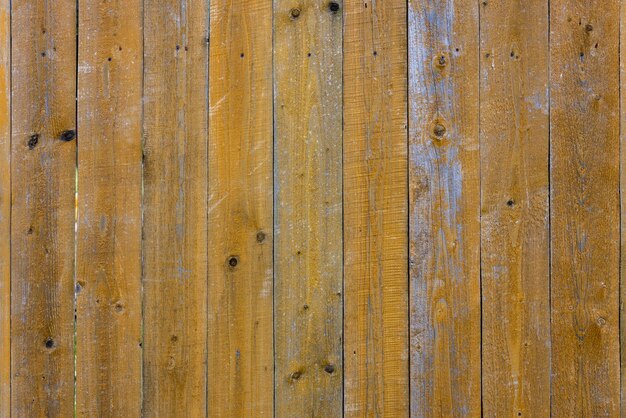 Old dry weathered gray and brown wooden planks board surface full frame background and texture