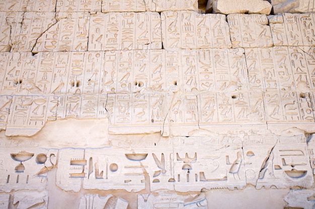 Old egypt hieroglyphs carved on the stone