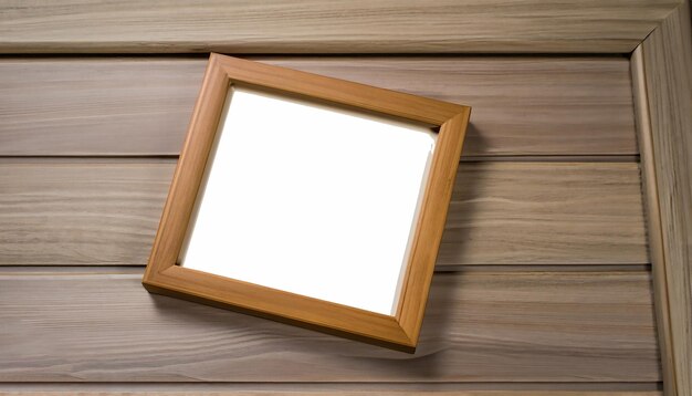 Old empty mock up picture frame on vintage wood background