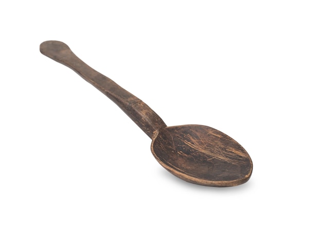 Old empty wooden spoon isolated on wooden background