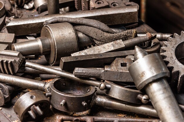 Old equipment machines tools in an abandoned mechanical factory