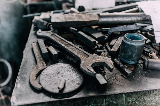 Old equipment machines tools in a rustic style in an abandoned mechanical factory