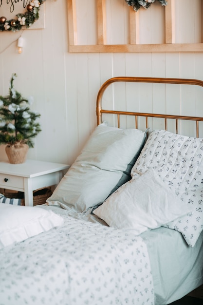 Old fashioned bed with many pillows
