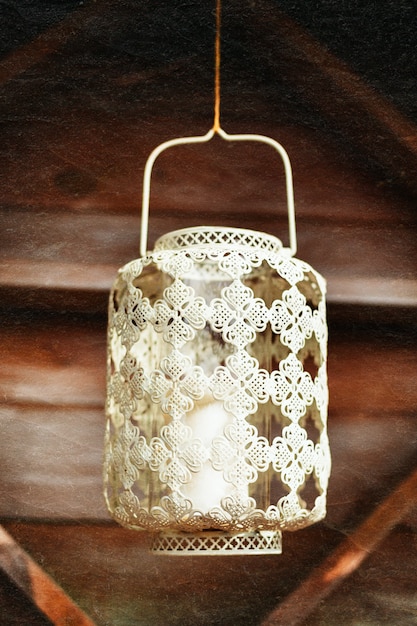 Photo old-fashioned lacy white lantern